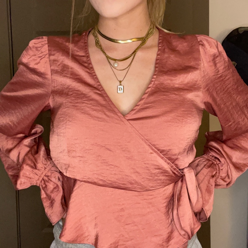 Vestique top. You put the string through a hole in the inside and it wraps.